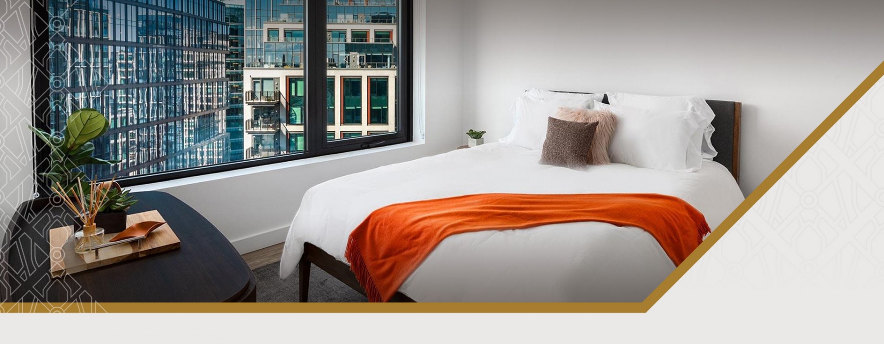 The Metlo Boston luxury apartment - Bedroom with Seaport Views