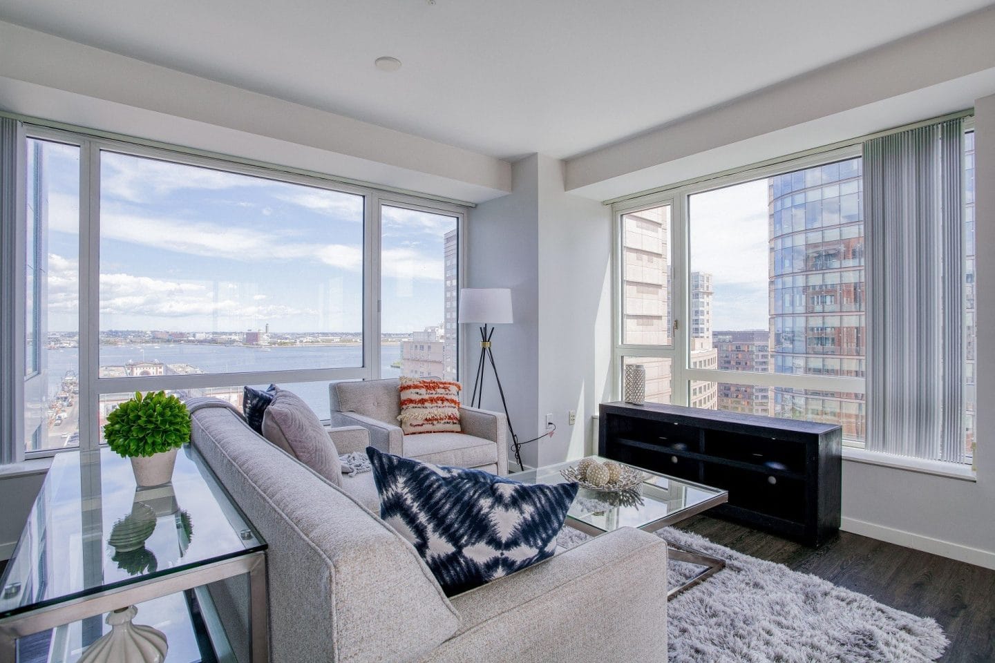 Waterside Place Seaport Boston luxury apartment - Living Room with Harbor Views