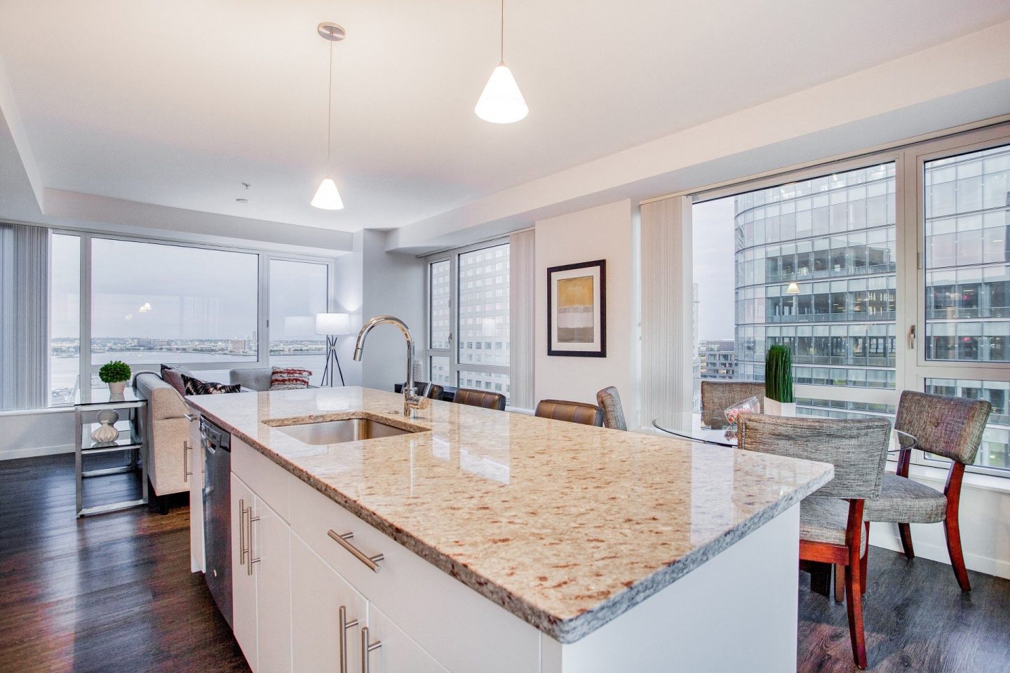 Waterside Place Seaport Boston luxury apartment - Open Kitchen & Living with Harbor Views